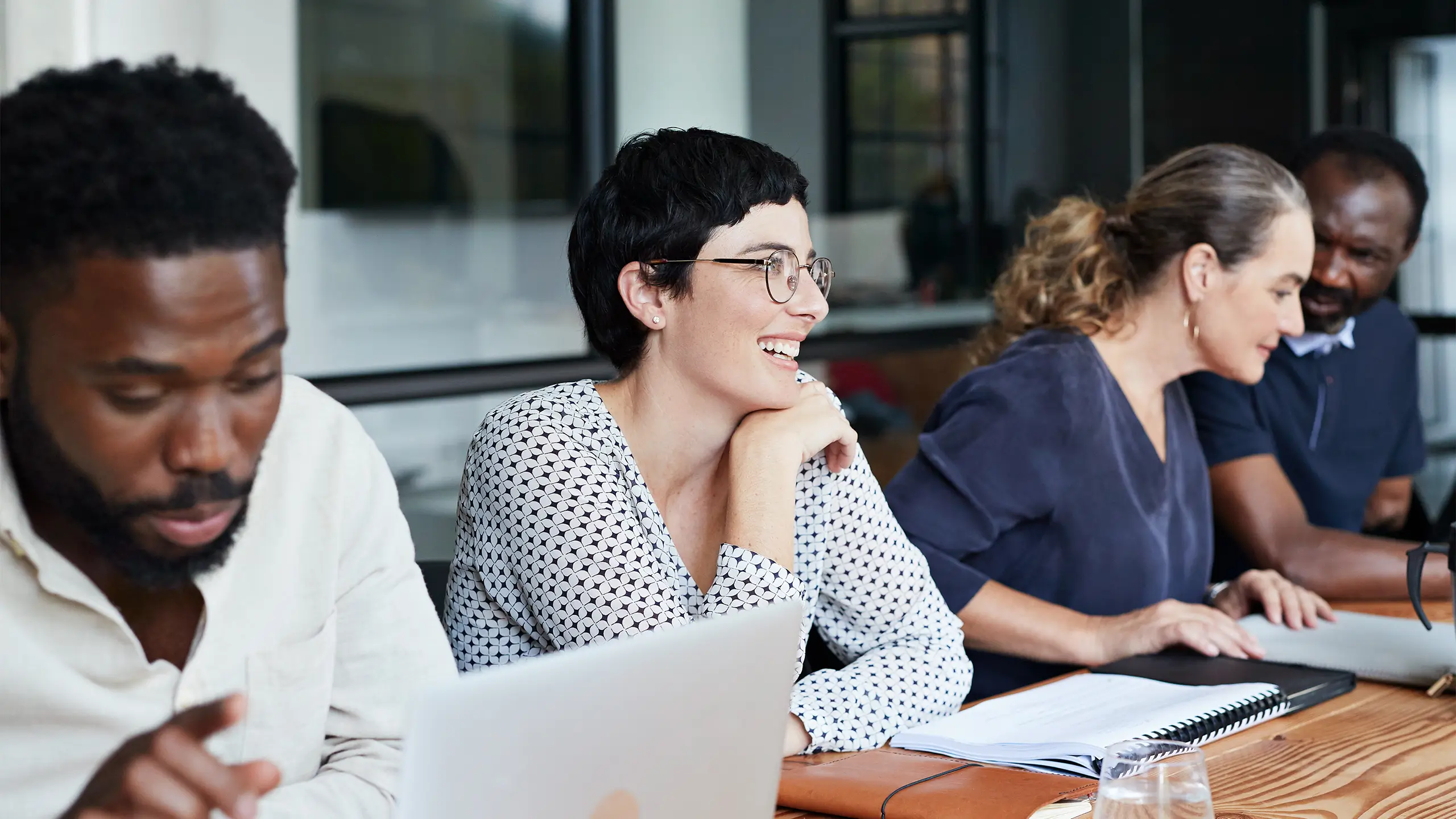 Business woman with colleagues during meeting